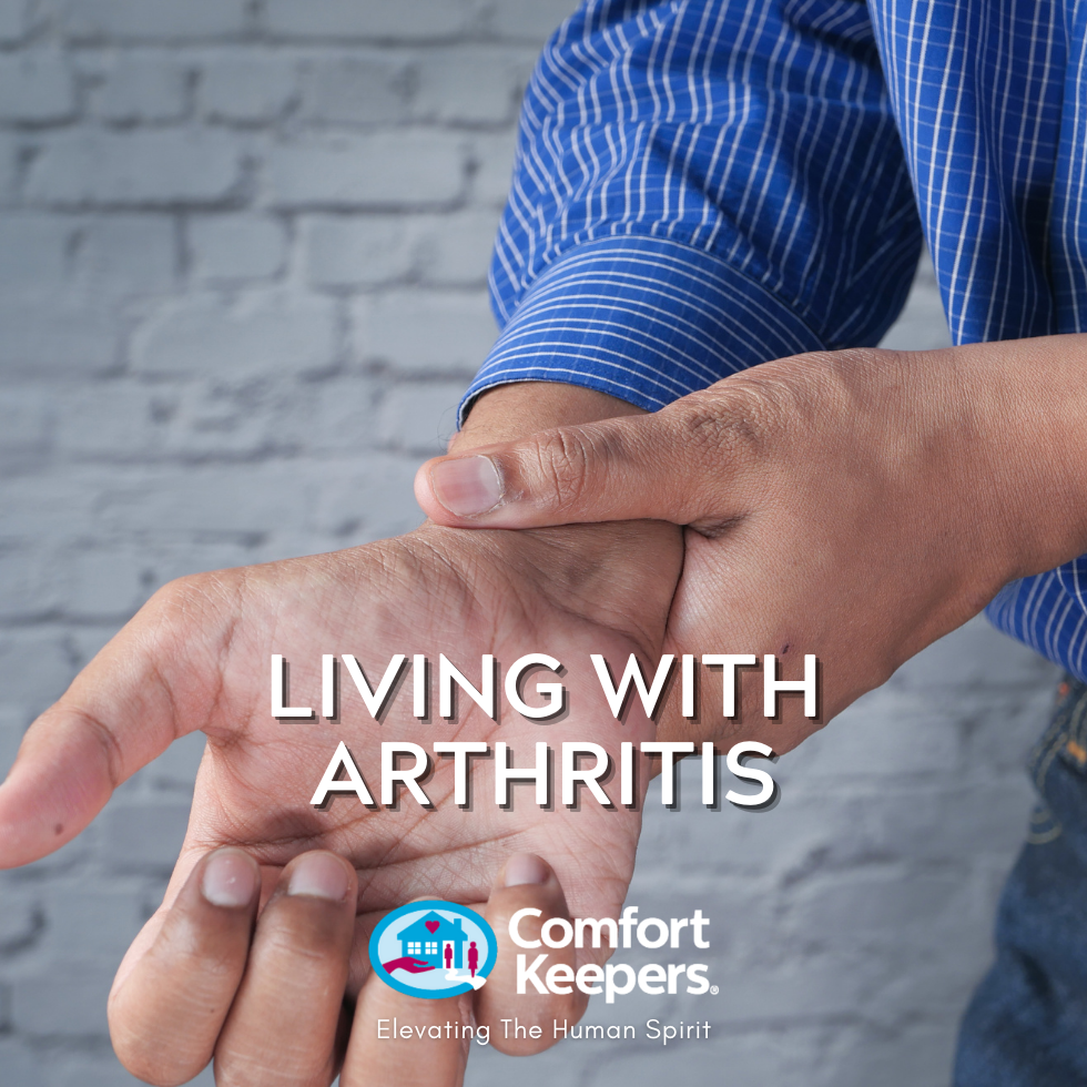 Senior gripping own hand seemingly in pain | Seniors and Arthritis | BLOG POST | Comfort Keepers Winnipeg