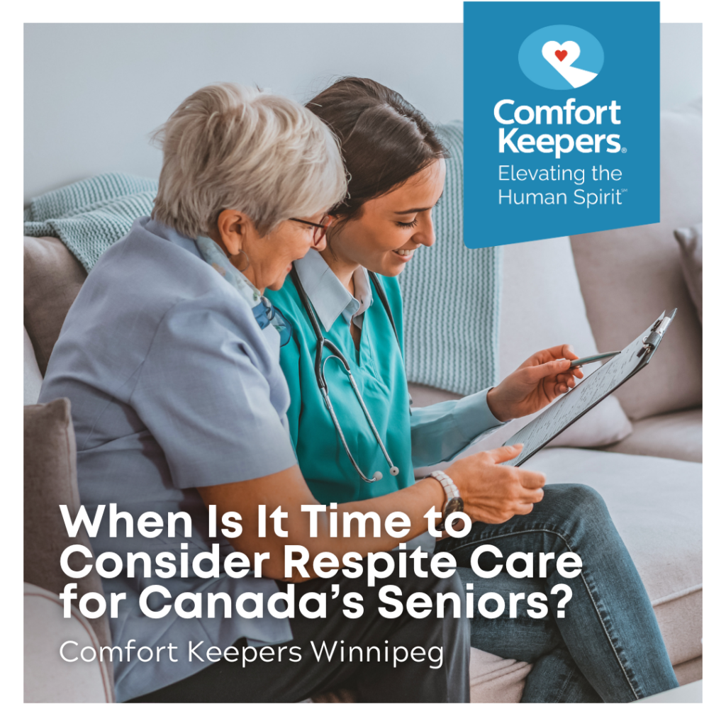 Senior seated on couch with caregiver with a clipboard | When Is It Time to Consider Respite Care for Canada's Seniors? | Comfort Keepers Winnipeg | BLOG POST