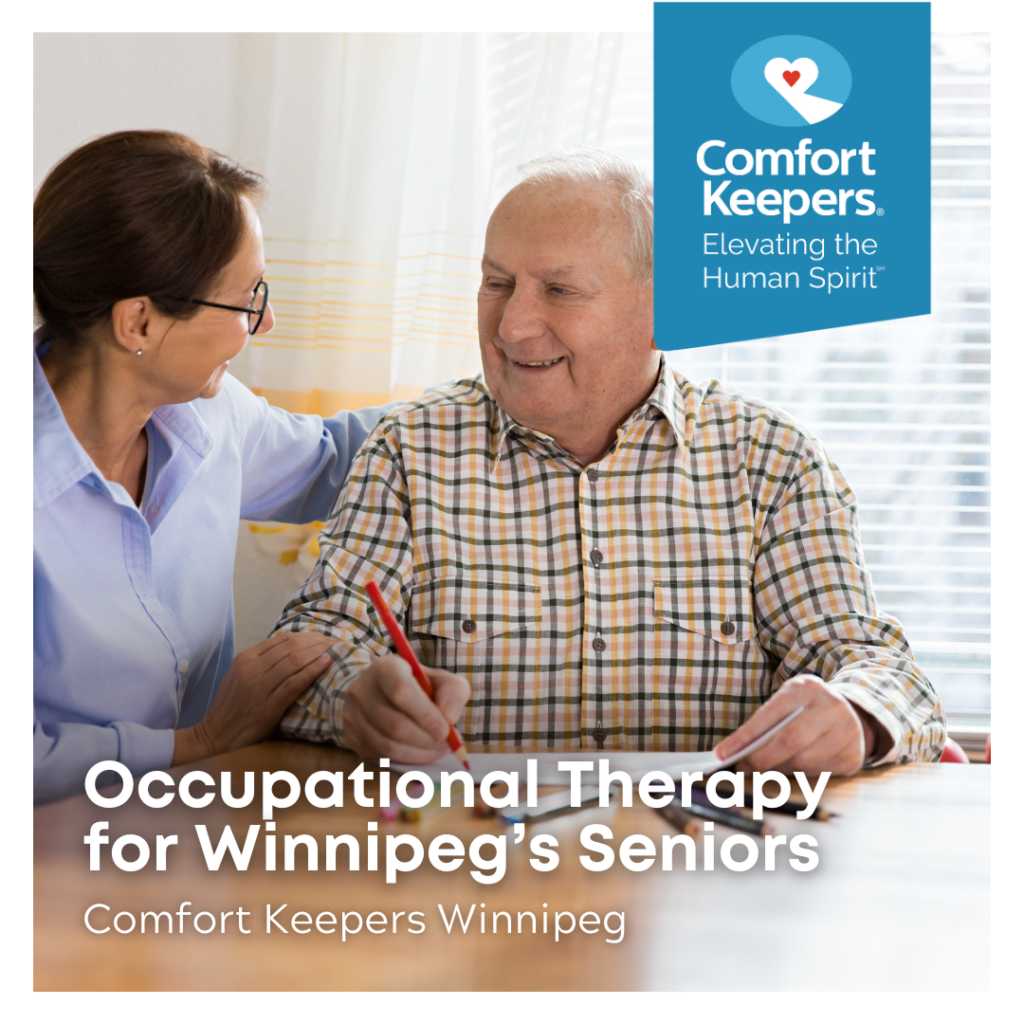 Senior male seated at table with caregiver | Occupational Therapy for Winnipeg’s Seniors | Comfort Keepers Winnipeg